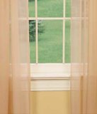 Long, sheer curtains on the left and the right side of the window