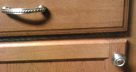 Kitchen cabinet hardware - wood cabinet with pull and knob