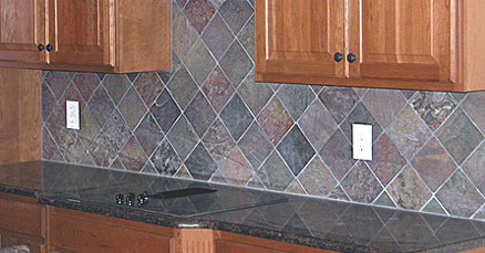 Ceramic backsplash in the form of tiles set on a diagonal