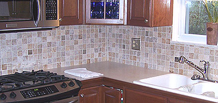 Mosaic backsplash made of small square tiles