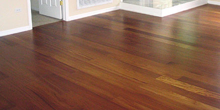 Prefinished teak flooring in a kitchen