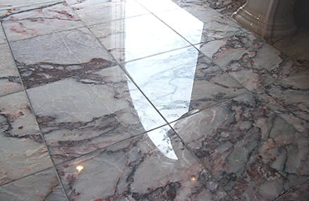 Polished marble flooring in a kitchen.