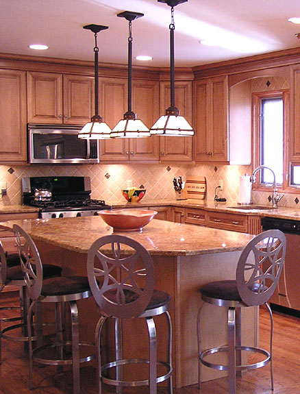 Kitchen island lighting idea - three pendant light fixtures over the island