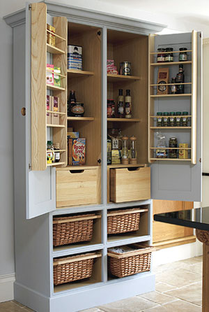 Free standing kitchen pantry cabinet with 4 sliding wicker baskets, 2 solid oak bread drawers and herb racks