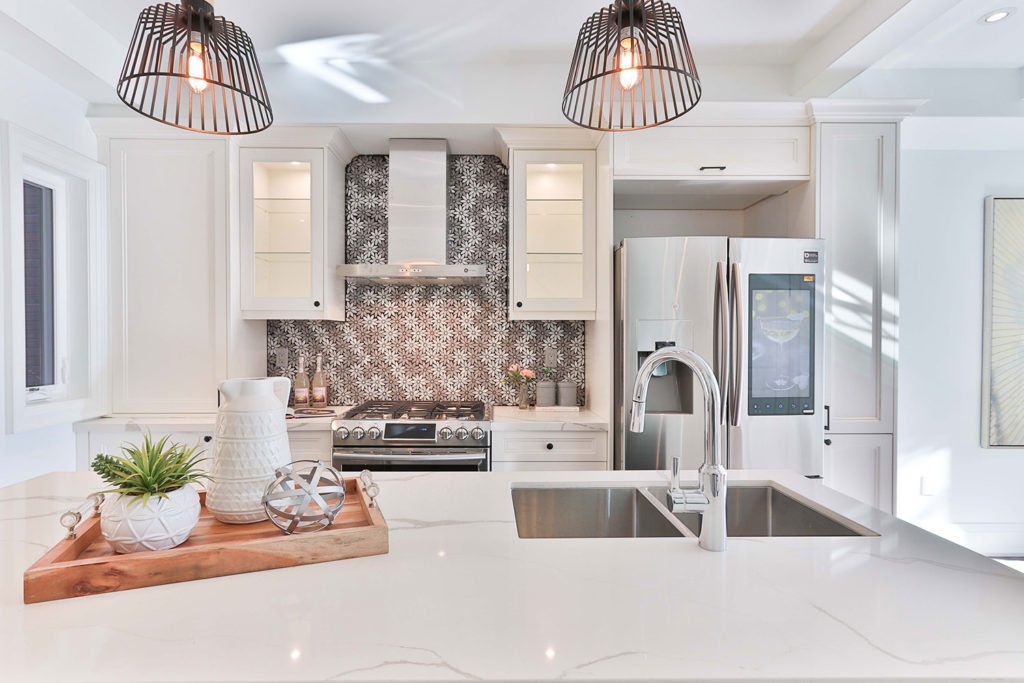 A beautiful white and clean kitchen