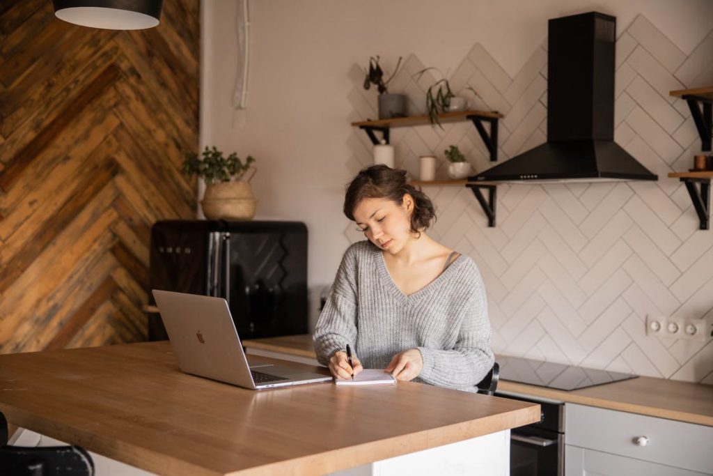 Creating a cleaning schedule for the exhaust fan in the kitchen